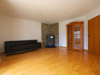 Helle 3,5-Zimmer-Erdgeschosswohnung mit Gartenzugang, Balkon & Garage in ruhiger Lage - Ringsheim Wohnzimmer